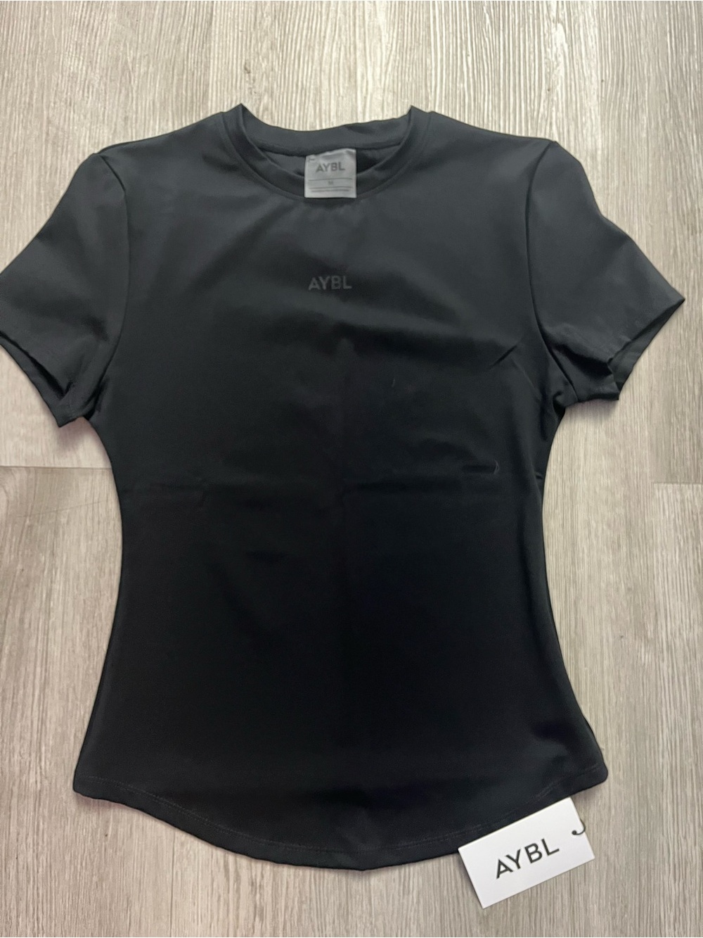 007–NWT AYBL Black Short Sleeve Performance Tee